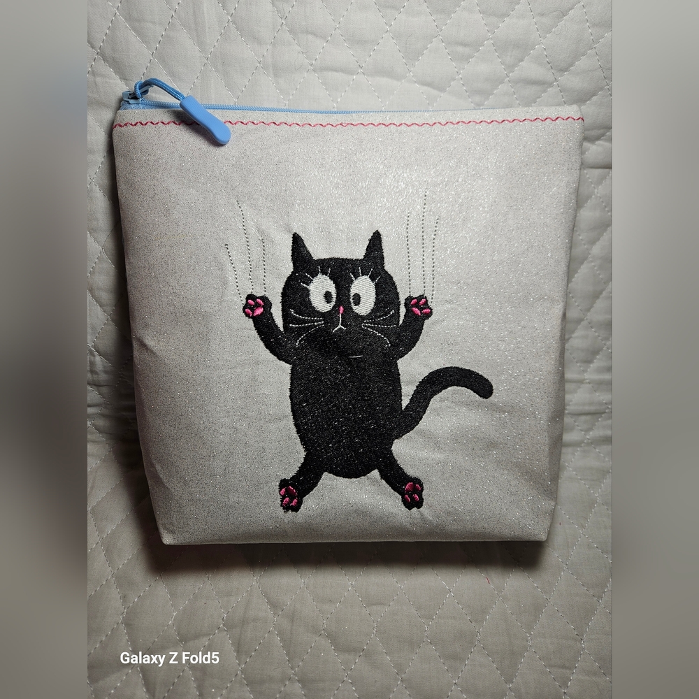 Black and Pink Cosmetic Bag with Playful Cat Design
